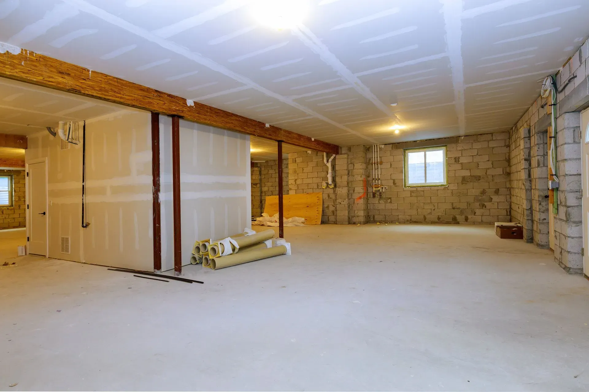 Unfinished basement with exposed walls