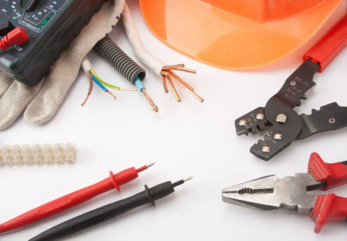 Wiring tools and safety gear displayed